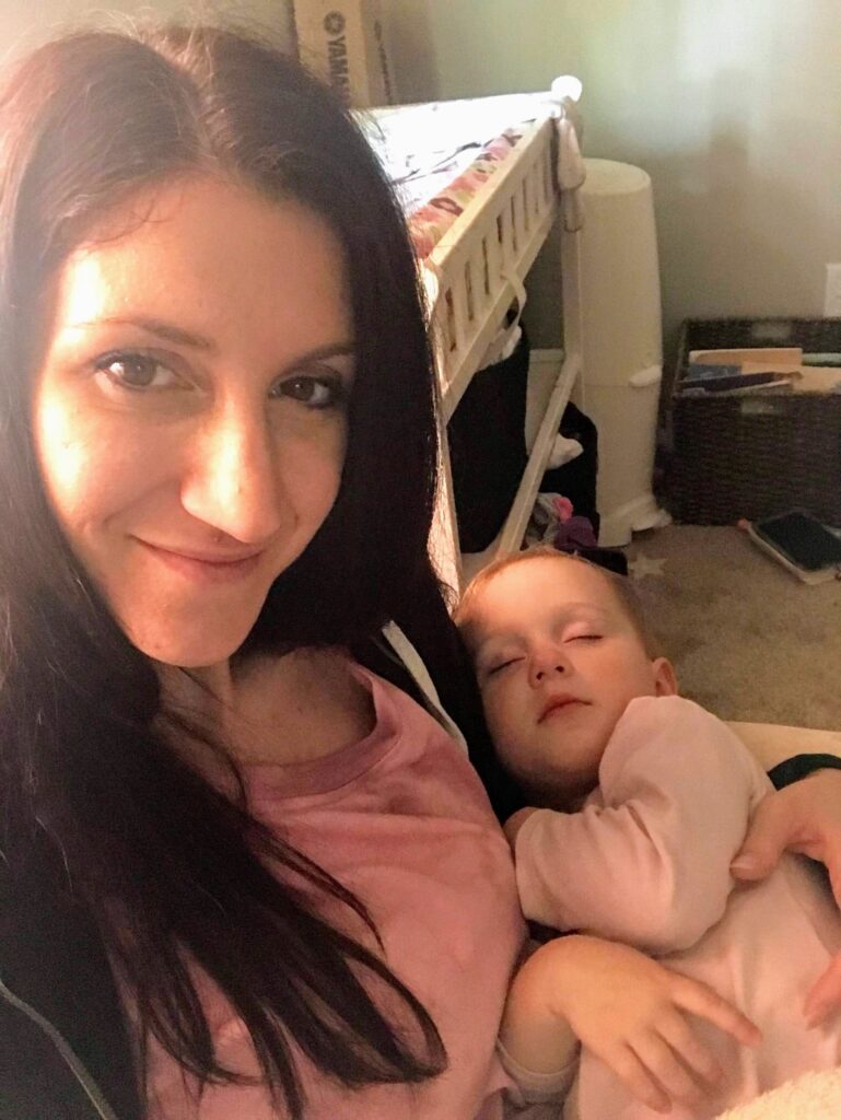 mom holding baby