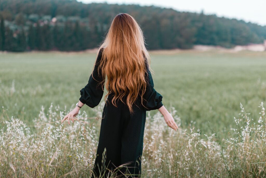 woman looking into field